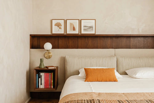 bedroom with floating bookshelf